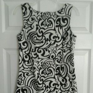 Very pretty black and white dress. Wear anywhere.